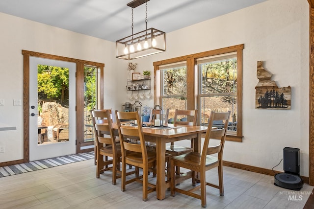 dining area featuring plenty of natural light