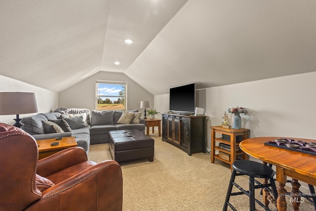 living room featuring light carpet and vaulted ceiling