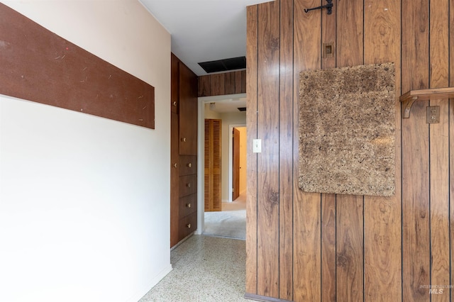 904 Lewis St, Moscow, ID 83843 - hallway featuring dark aggregate flooring and baseboards