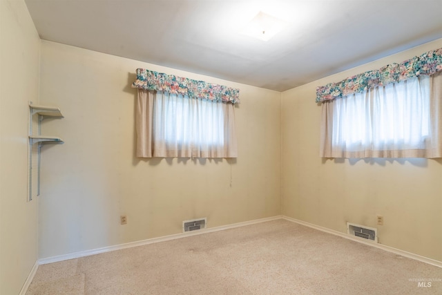904 Lewis St, Moscow, ID 83843 - empty room featuring carpet and baseboards