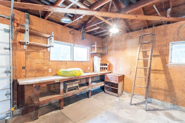 904 Lewis St, Moscow, ID 83843 - miscellaneous room featuring a workshop area and unfinished concrete flooring