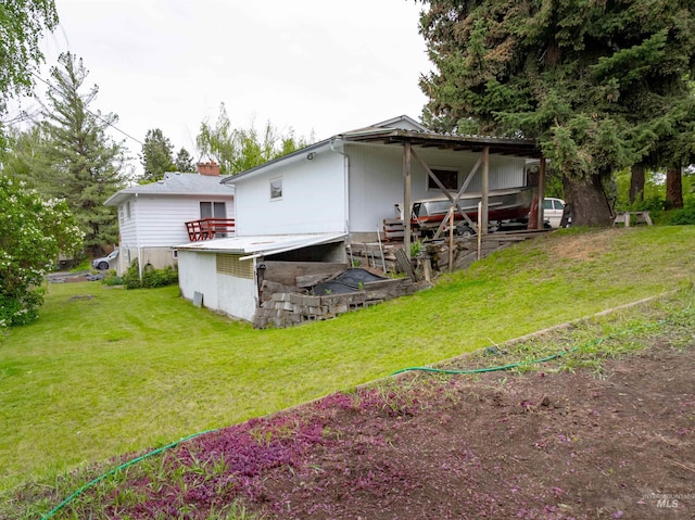 904 Lewis St, Moscow, ID 83843 - back of house with a lawn