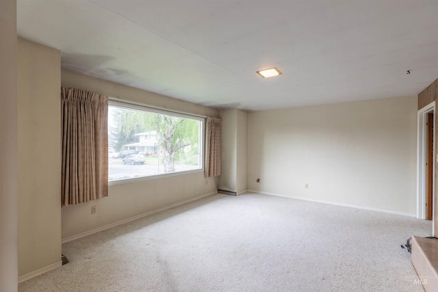 904 Lewis St, Moscow, ID 83843 - carpeted empty room featuring baseboards