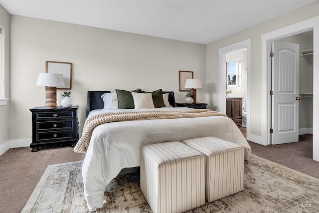 2043 E Lodge Trail Dr, Meridian, ID 83642 - carpeted bedroom with baseboards and ensuite bathroom