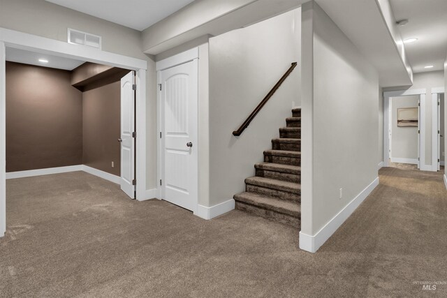 2043 E Lodge Trail Dr, Meridian, ID 83642 - basement with carpet, stairs, and baseboards