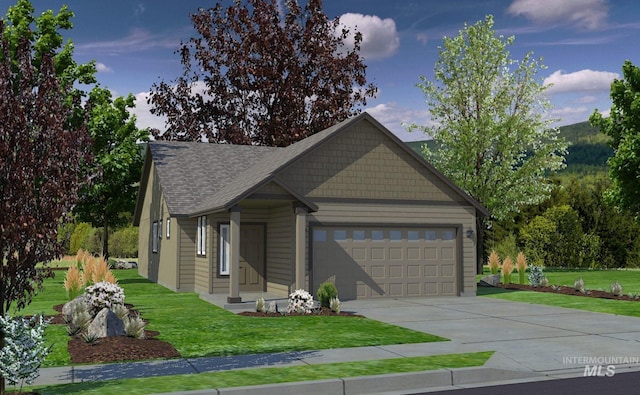 view of front of house featuring a front yard and a garage