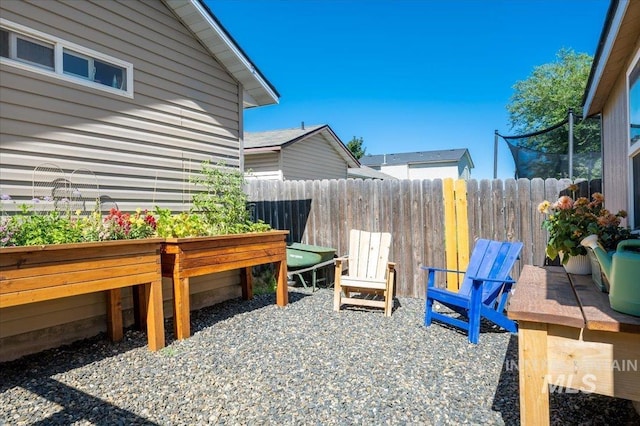 view of patio / terrace featuring fence