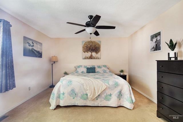 426 Carriage Ln, Twin Falls, ID 83301 - carpeted bedroom featuring baseboards and a ceiling fan