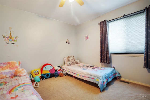 426 Carriage Ln, Twin Falls, ID 83301 - carpeted bedroom with a ceiling fan and baseboards