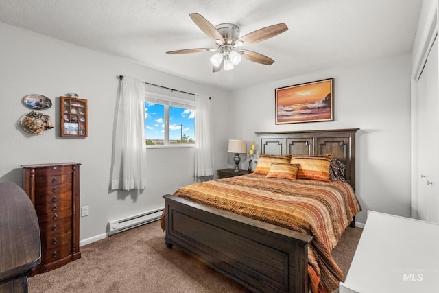 2208 Keithley Creek Rd, Midvale, ID 83645 - bedroom with baseboard heating, carpet flooring, ceiling fan, and a closet
