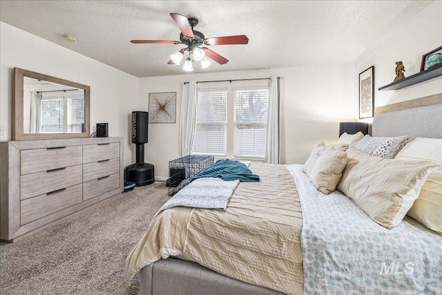 2030 W Cabot Ave, Nampa, ID 83686 - bedroom featuring a ceiling fan, light colored carpet, and a textured ceiling