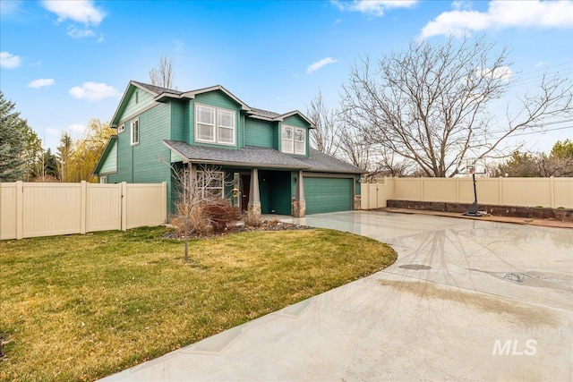 2030 W Cabot Ave, Nampa, ID 83686 - view of front of property with a garage, driveway, a front yard, and fence