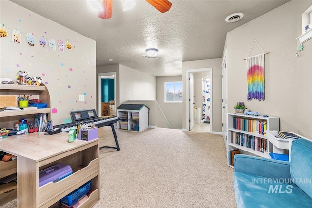 2030 W Cabot Ave, Nampa, ID 83686 - playroom featuring visible vents, baseboards, ceiling fan, carpet flooring, and a textured ceiling