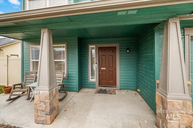 2030 W Cabot Ave, Nampa, ID 83686 - property entrance with a porch and fence