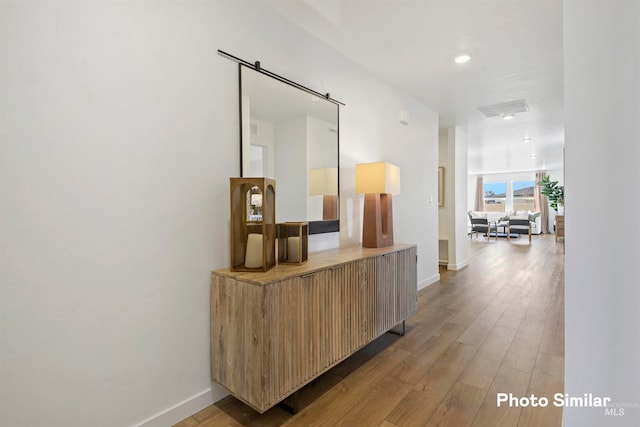 hall featuring light hardwood / wood-style floors