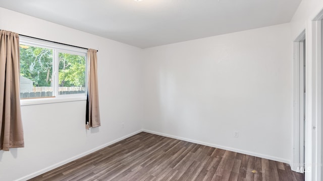 219 14th Ave N, Nampa, ID 83687 - spare room with wood finished floors and baseboards