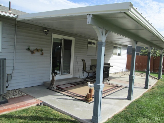 view of patio / terrace featuring fence