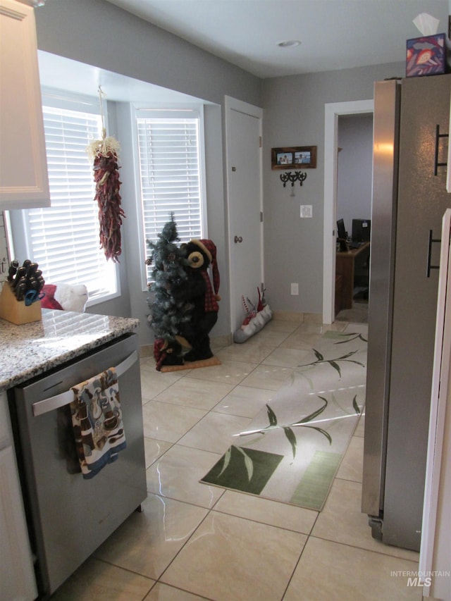 interior space featuring light tile patterned flooring