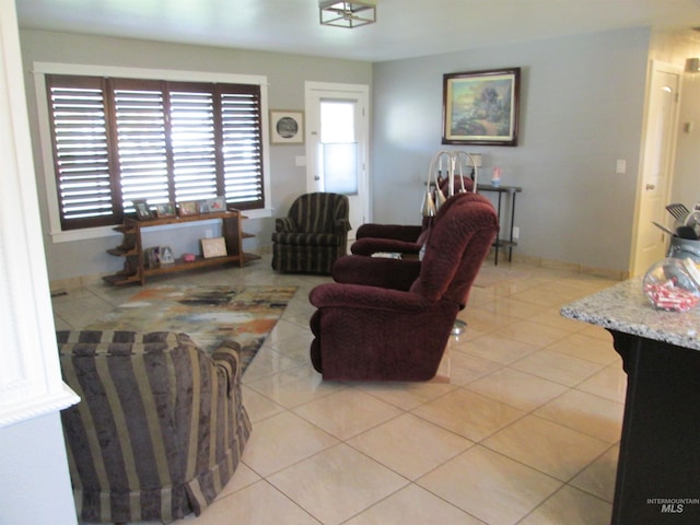 living room with light tile patterned flooring