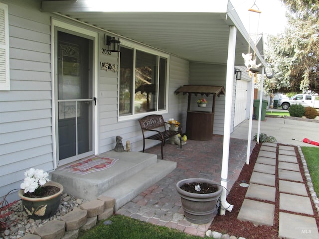 view of patio featuring a porch