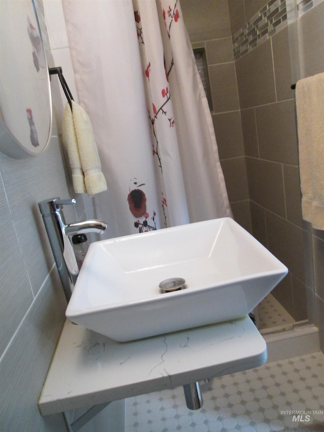 bathroom with a stall shower