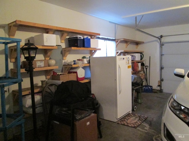 garage with freestanding refrigerator