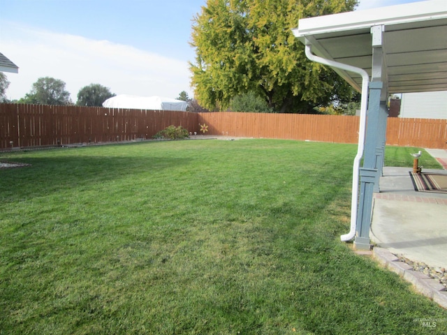 view of yard featuring a fenced backyard