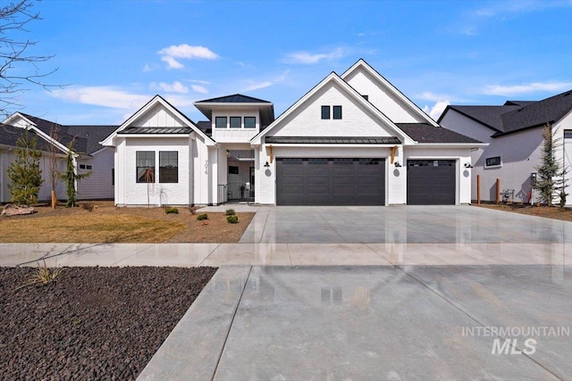 view of front of home with a garage