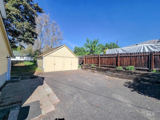 1603 11th Ave, Lewiston, ID 83501 - garage with a storage shed and fence