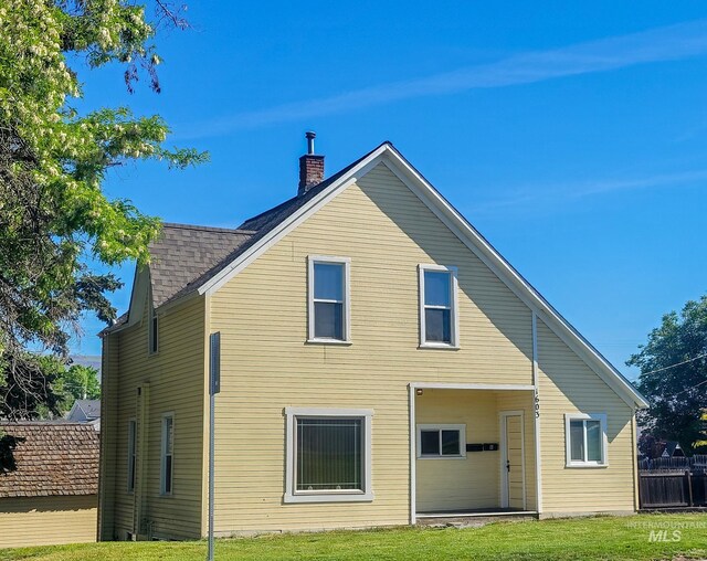 1603 11th Ave, Lewiston, ID 83501 - rear view of property with a chimney