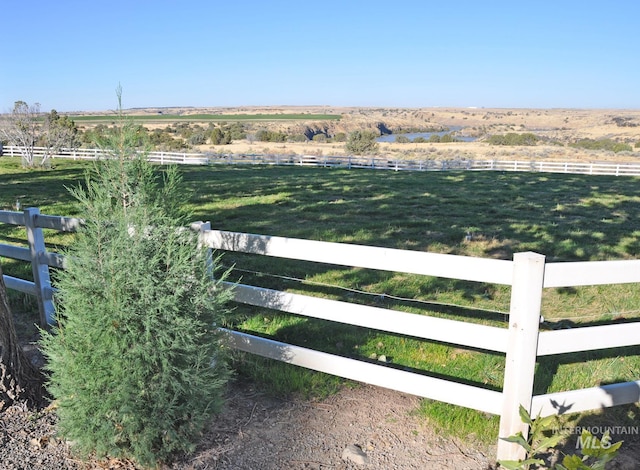 exterior space with a rural view