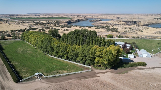 aerial view featuring a rural view and a water view