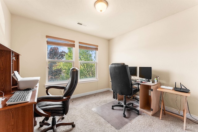 home office with carpet flooring and baseboards