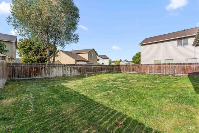 view of yard featuring a residential view