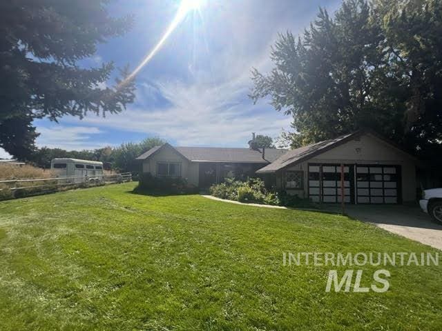 view of yard with a garage