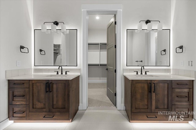 bathroom featuring tile patterned floors and vanity