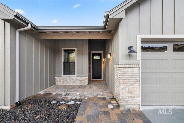 entrance to property featuring a garage