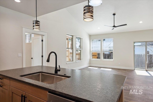 701 N 2nd Ave, Hailey, ID 83333 - kitchen with pendant lighting, open floor plan, ceiling fan, dark wood-style floors, and a sink