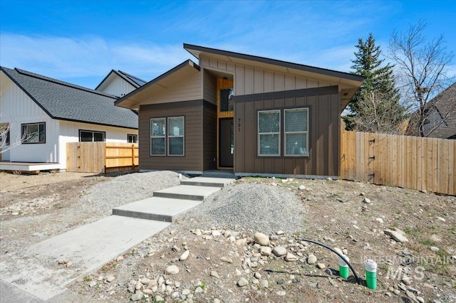 701 N 2nd Ave, Hailey, ID 83333 - view of front of home featuring fence, a gate, and board and batten siding