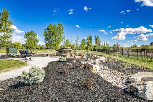 view of yard with a patio and fence