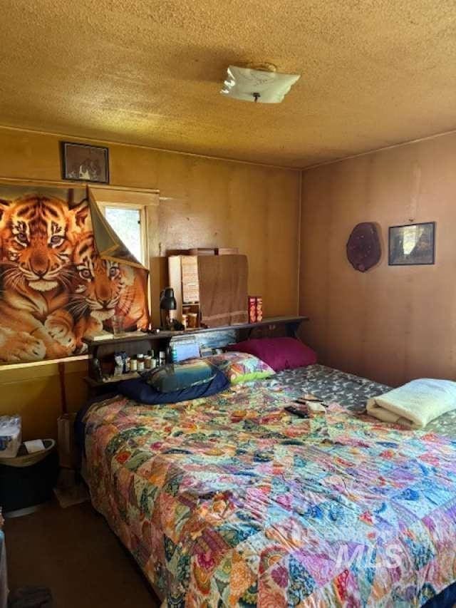 225 E Melrose St, Boise, ID 83706 - bedroom with a textured ceiling