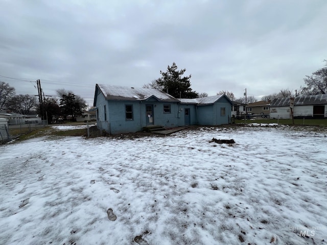 view of snow covered property