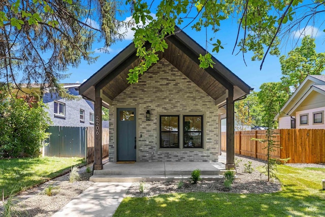2206 N 20th, Boise, ID 83702 - view of front facade featuring brick siding and a porch