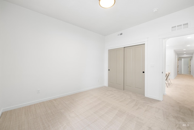 2206 N 20th, Boise, ID 83702 - unfurnished bedroom featuring light colored carpet and a closet