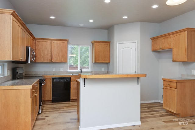 10224 W Altair, Star, ID 83669 - kitchen featuring range with electric stovetop, dishwasher, light wood-type flooring, recessed lighting, and a center island