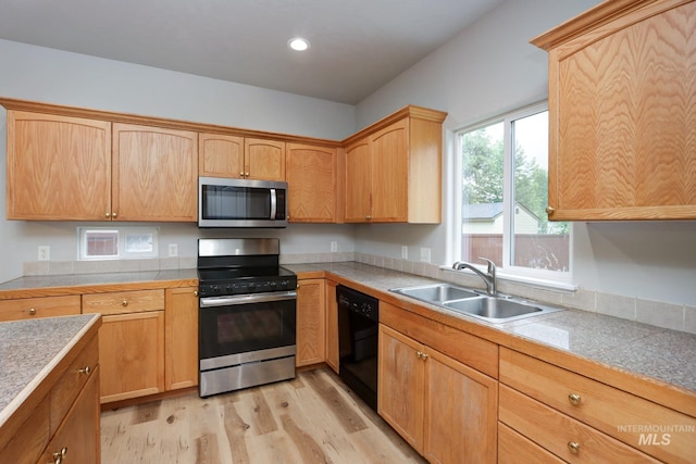 10224 W Altair, Star, ID 83669 - kitchen featuring appliances with stainless steel finishes, light wood-style flooring, recessed lighting, and light brown cabinetry