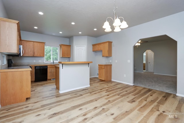 10224 W Altair, Star, ID 83669 - kitchen with black dishwasher, light wood-style floors, arched walkways, stainless steel microwave, and recessed lighting
