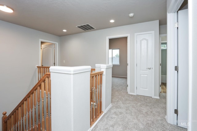 10224 W Altair, Star, ID 83669 - hallway with an upstairs landing, carpet flooring, and recessed lighting