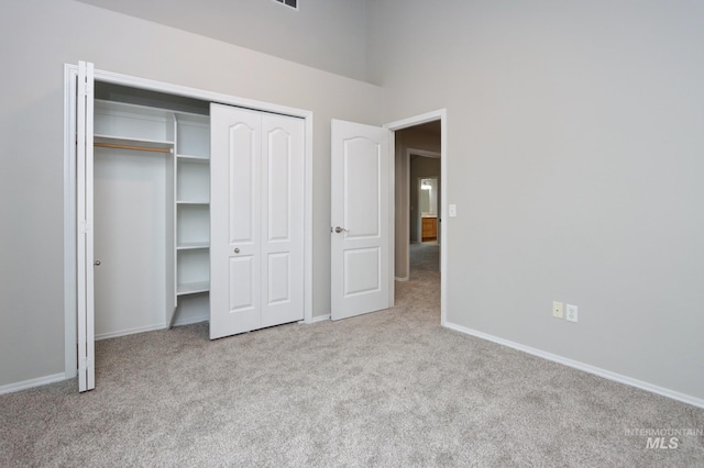 10224 W Altair, Star, ID 83669 - unfurnished bedroom with carpet floors, a closet, and a high ceiling