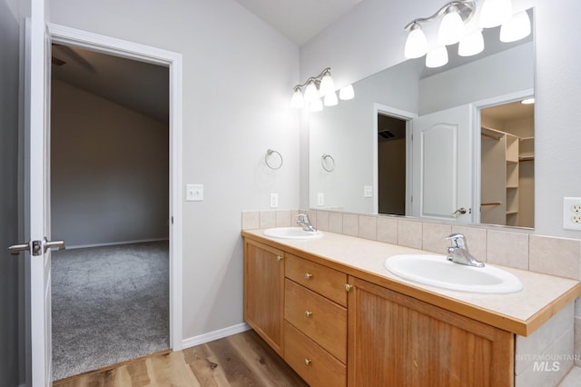 10224 W Altair, Star, ID 83669 - bathroom with double vanity and wood finished floors